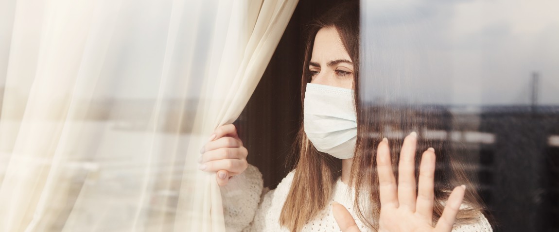 young woman wearing medical mask