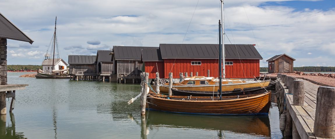 old sailing boats and wooden sheds